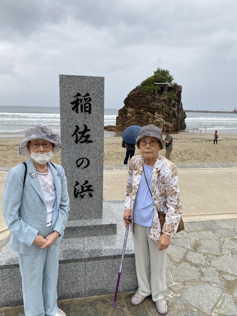 稲佐の浜と森山院長の家族